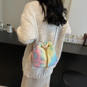 Colorful plush bucket bag with golden drawstring and pearl chain for casual wear