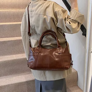 Vintage dark brown large tote bag with top handle and shoulder strap for women