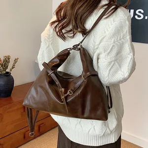 Brown large capacity leather tote bag with adjustable shoulder strap for women