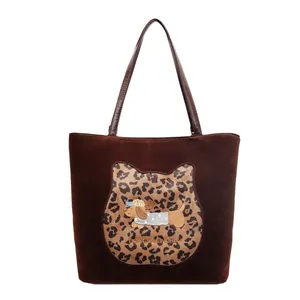 Commuter tote bag in dark brown suede with leopard cat patch and puppy embroidery