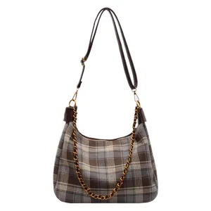 Sac bandoulière à carreaux pour femme avec lanière en cuir brun et chaîne dorée