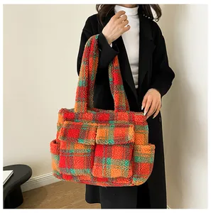 Detail of colorful plaid fleece tote bag with large capacity and functional pockets