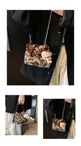 Detail of leopard print faux fur bag with amber beads and Hello Kitty plush pendant