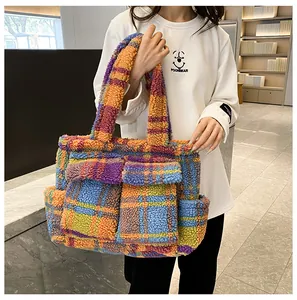 Close-up of the plush faux fur tote bag featuring a colorful checkerboard pattern and pockets