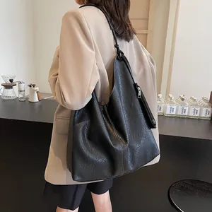Black textured leather Hobo tote bag with large capacity for daily commuting and leisure