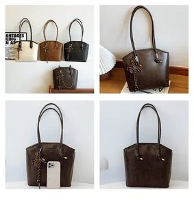 Detail showing vintage oil wax leather tote bags in four colors with braided fringe tassel