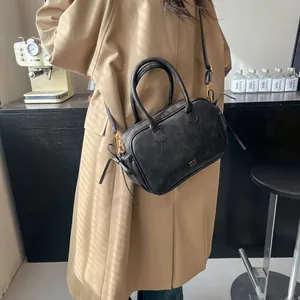 Classic black PU leather crossbody bag with top handles and chic side bow decoration