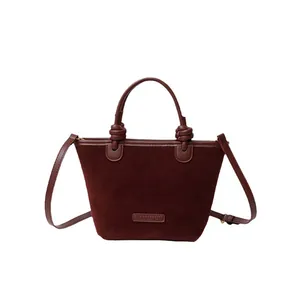 Retro burgundy suede tote bag with unique knot handle and crossbody strap for women