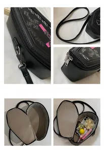 Detailed views of gothic coffin-shaped crossbody bag with cross print and internal storage