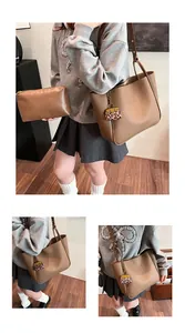 Brown lychee leather tote bag set with matching pouch and leopard print charm accessory