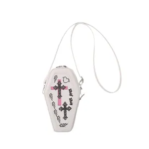Unique coffin-shaped white crossbody bag with pink cross print and gothic baby design