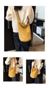 Detail view of mustard yellow plush bucket bag showing soft texture and large capacity