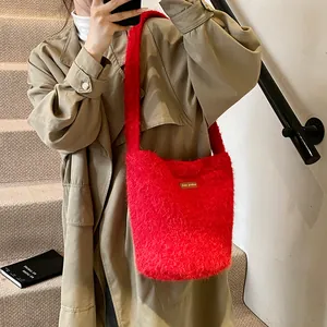 Red plush bucket bag with leather patch, soft faux fur shoulder bag for winter fashion