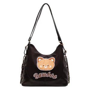 Sac fourre-tout noir en nylon avec broderie ours, chaînes et grand compartiment mode