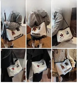 Collage of model carrying cream canvas tote bag with leather trim and strong embroidery