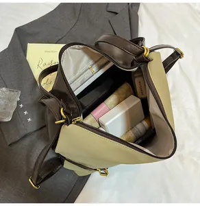 Top view of spacious interior in contrast color tote bag with zippered pocket