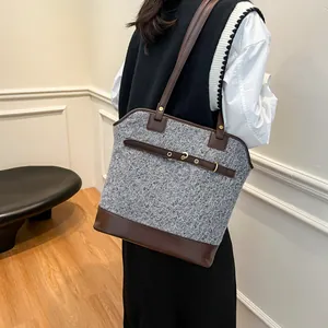 Vintage women's grey knit tote bag with brown faux leather straps for autumn and winter
