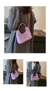 Detail view of purple faux fur handbag with detachable strap and plush texture finish