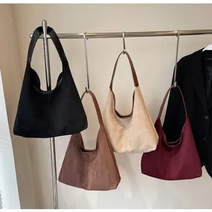 Selection of large matte suede hobo tote bags in black, coffee, beige, and burgundy colors