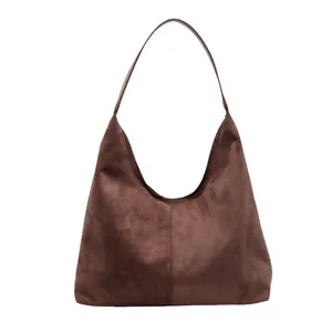 Minimalist coffee brown suede hobo shoulder bag with matte finish and vertical seam detail