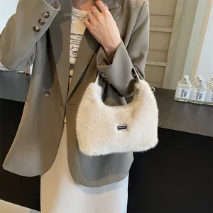 Chic beige faux fur hobo handbag with plush texture and silver brand plate