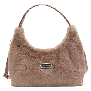 Brown faux fur plush handbag with leather handles and silver brand plaque for winter fashion