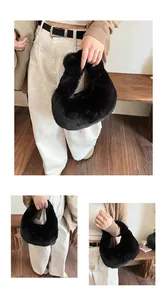 Detail view of stylish crescent-shaped black faux fur handbag with soft plush texture