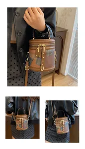 Detailed macro view of retro bucket bag with patchwork leather and metal zipper details