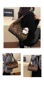 Detail of leopard print tote bag featuring a velvet texture and cute plush puppy charm