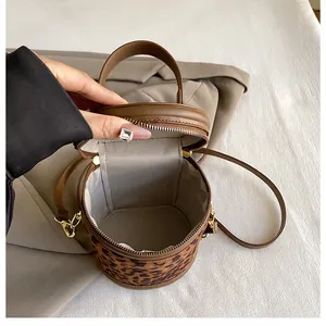 Top view of leopard print bucket bag showing interior space with herringbone lining