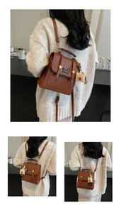 Brown leather backpack with dachshund embroidery and cute biscuit plush charm