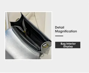 Vue détaillée des compartiments internes et de la cloison zippée du sac argenté