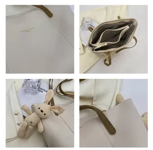 Detailed views of beige tote bag with multi-layer interior and plush bunny charm