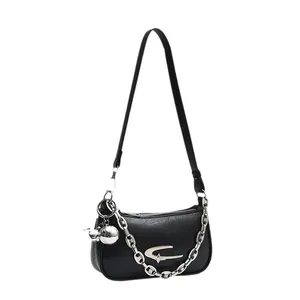 Chic black pleated shoulder bag with chunky silver chain and Y2K star logo on white background