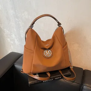 Damen Mode PU Leder Mehrzweck Rucksack Umhängetasche Mit Metall M Logo Große Kapazität Lässige Reise Tote Bag