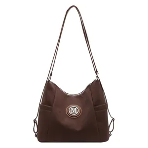 Dunkelbrauner Damen Rucksack aus Nylon mit M-Logo und praktischen Seitentaschen
