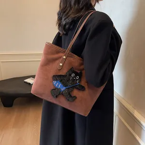 Brown suede tote bag with 3D cat embroidery and leather handles for casual commute