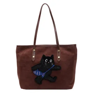 Brown felt tote bag with cute 3D cat embroidery and blue fish detail for casual travel