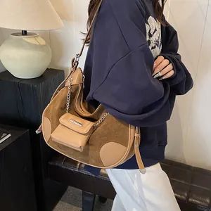 Vintage style brown patchwork suede shoulder bag with metal chain and mini pouch