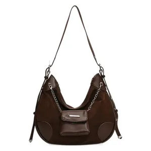 Deep brown suede and leather patchwork half-moon shoulder bag with silver chain detail