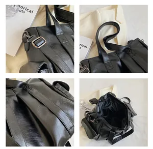 Détails du grand cabas en similicuir noir avec boucles métalliques et grand espace