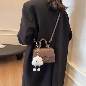 Vintage dark brown crossbody bag with handle and cute white cloud plush pendant