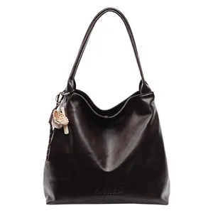 Chic dark brown faux leather tote bag with baseball charm and H.SHAN brand logo