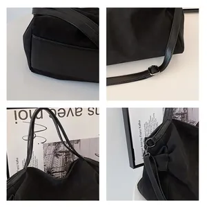 Detail showing matte faux suede fabric with leather trim and adjustable silver buckle