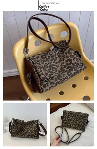 Detail view of coffee-colored leopard print canvas tote bag with adjustable shoulder straps