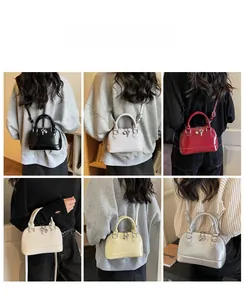 Detailed views of mini shell crossbody bag in six colors with heart charms
