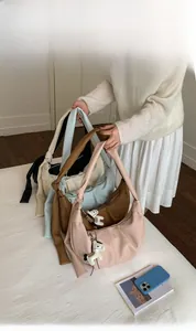 Chic hobo crescent bag collection in five colors with stylish knotted handles