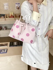 Borsa tote grande chic a pois rosa con manici lunghi per un pendolarismo elegante