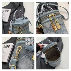 Detailed views of denim bucket bag showing scarf handle, metal lock, and interior space