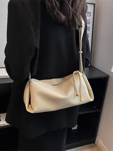 Chic beige leather shoulder bag with lychee texture and gold accents for women